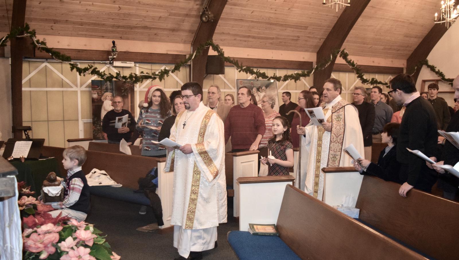 Members of the congregation gathered in the sanctuary for a Christmas service