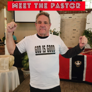 Pastor Tim in a God Is Good Tshirt,